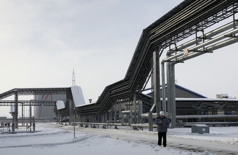 FILE PHOTO: An oil storage tank of Russian oil pipeline monopoly Transneft is pictured at the Baltic Sea port of Ust-Luga