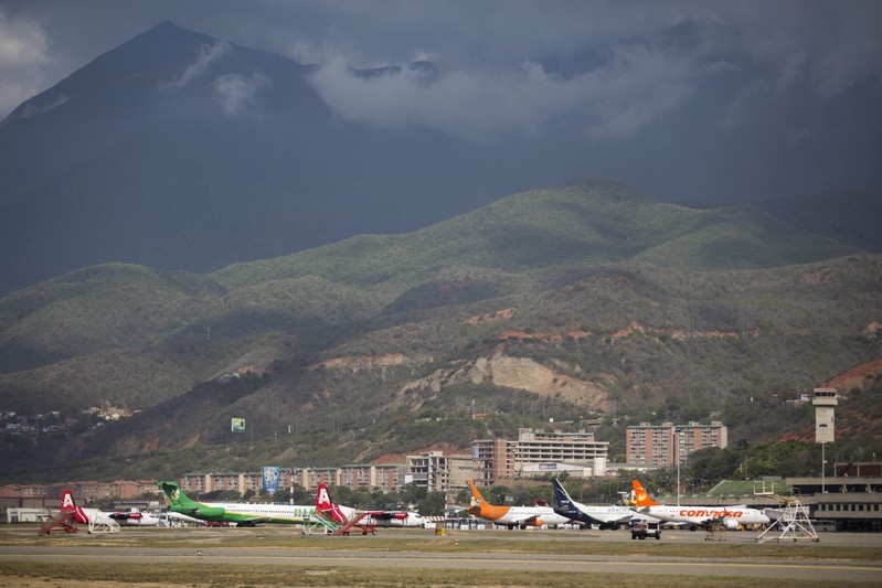 FILE PHOTO: Aircraft are seen at a runway on the Simon Bolivar airport in Caracas