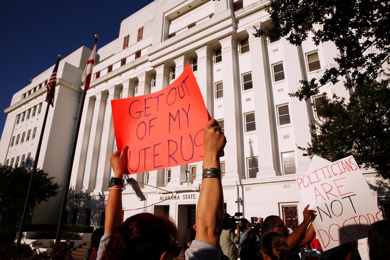 Pro-choice supporters protest in front of the Alabama State House as Alabama state Senate votes on the strictest anti-abortion bill in the United States at the Alabama Legislature in Montgomery