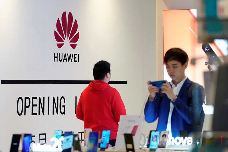 Huawei smartphones are seen displayed inside a shopping mall in Shanghai