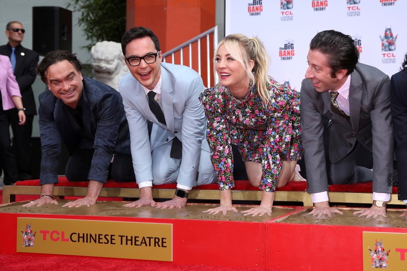 FILE PHOTO: Actors Johnny Galecki, Jim Parsons, Kaley Cuoco and Simon Helberg participate in the cement handprints ceremony for the cast of the television comedy
