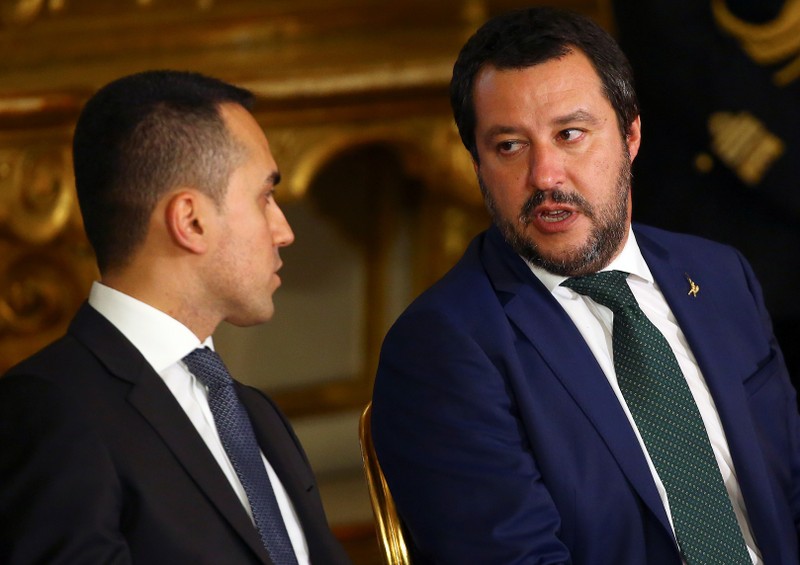 Interior Minister Matteo Salvini talks with Italy's Minister of Labor and Industry Luigi Di Maio at the Quirinal palace in Rome