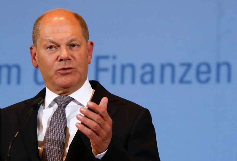 Finance Minister Olaf Scholz addresses a news conference to present the results of the latest tax revenue estimate in Berlin
