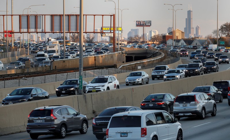 FILE PHOTO: Travelers are stuck in a traffic jam as people hit the road before the busy Thanksgiving Day weekend in Chicago, Illinois