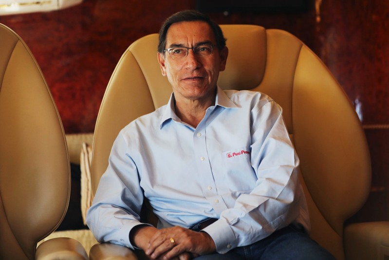 Peru's President Martin Vizcarra speaks during an interview with Reuters on board the presidential plane returning from Madre de Dios to Lima