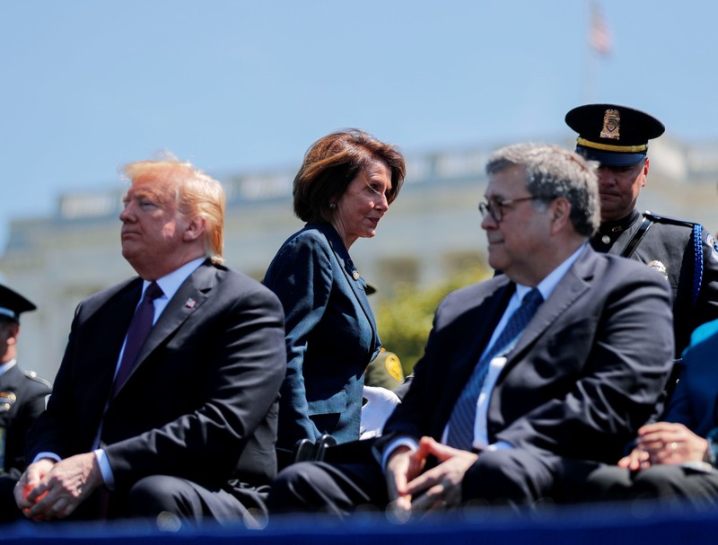 FILE PHOTO: Speaker of the House Pelosi walks behind President Trump and Attorney General Barr as they attend National Peace Officers Memorial Service on Capitol Hill in Washington