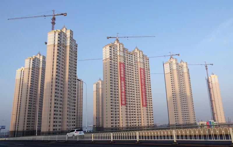 Residential buildings under construction are seen in Jinpu New District in Dalian, Liaoning