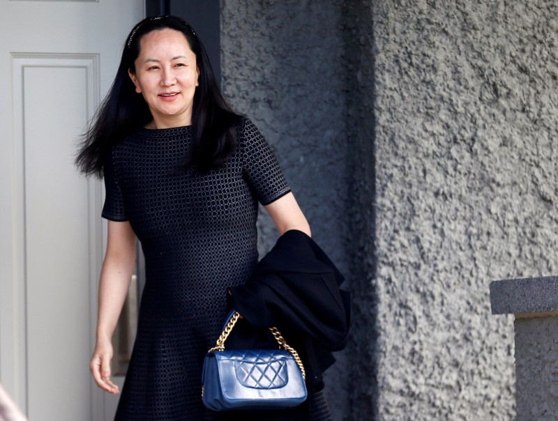 Huawei's Financial Chief Meng Wanzhou leaves her family home in Vancouver