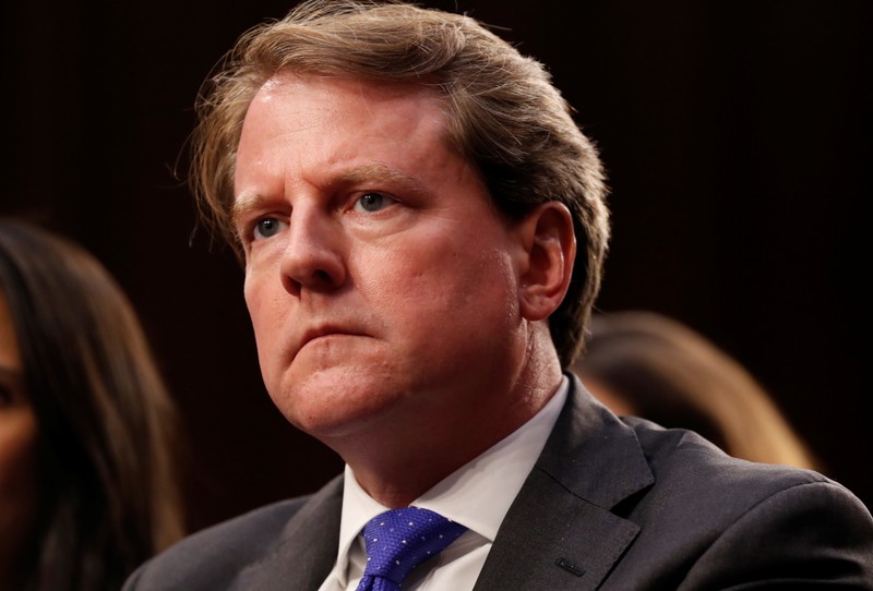 FILE PHOTO - White House Counsel Don McGahn listens during U.S. Supreme Court Nominee Judge Kavanaugh's Senate confirmation hearing in Washington