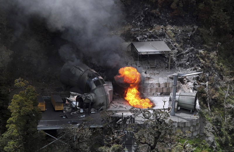 Flame burns from the end of a ventilation shaft of the Pike River coal mine near Greymouth