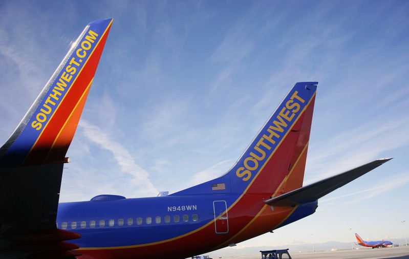 FILE PHOTO: A Southwest Airlines jet waits on the tarmac at Denver International Airport in Denver