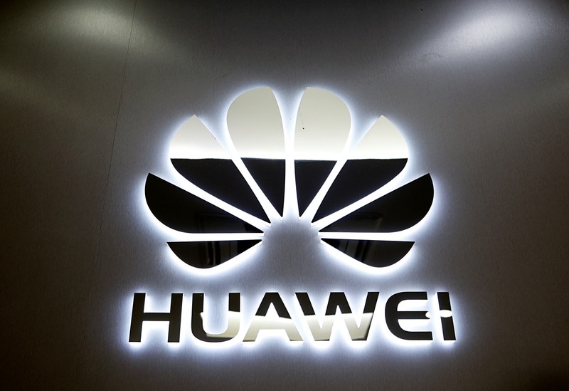 The logo of Huawei is pictured at a mobile phone shop in Singapore