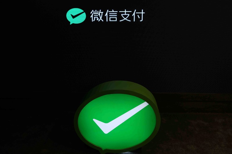 FILE PHOTO: A Wechat Pay sign is pictured at a Wechat pop-up store in Shanghai