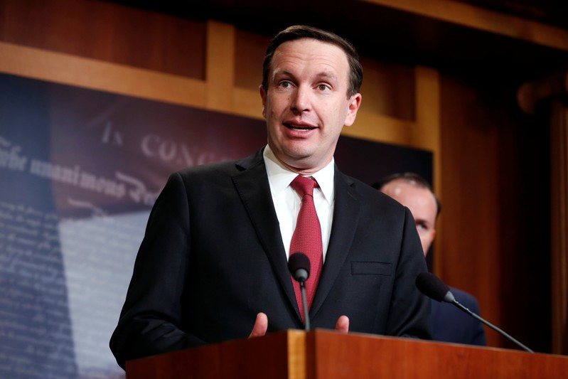 FILE PHOTO - Senator Chris Murphy (D-CT) speaks after the senate voted on a resolution ending U.S. military support for the war in Yemen on Capitol Hill in Washington