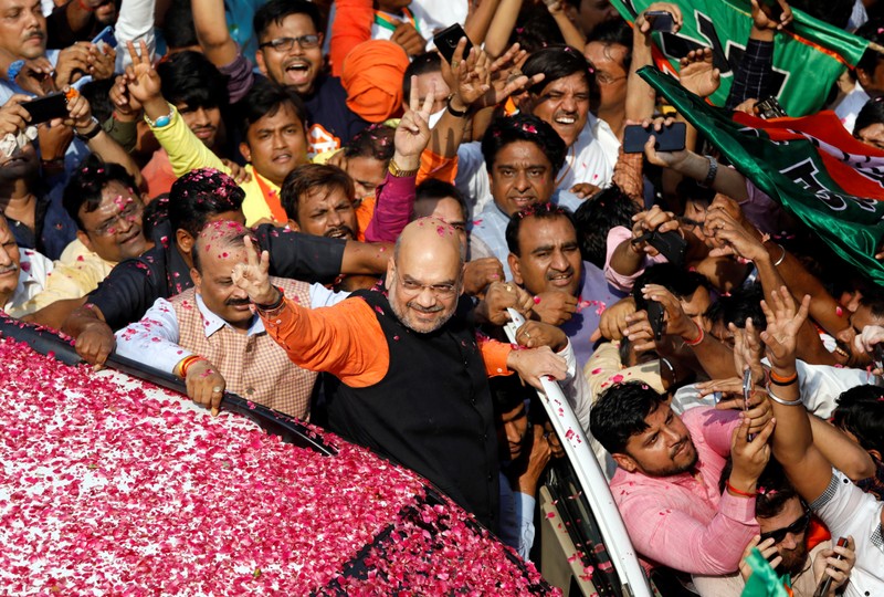 Bharatiya Janata Party President Amit Shah arrives at the party headquarters after learning the initial election results, in New Delhi,