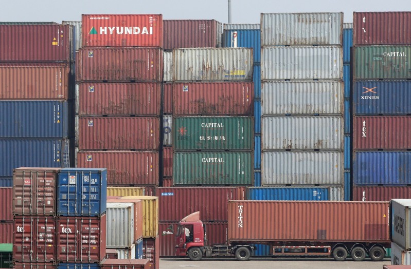 A container is transported into a logistics center near Tianjin Port