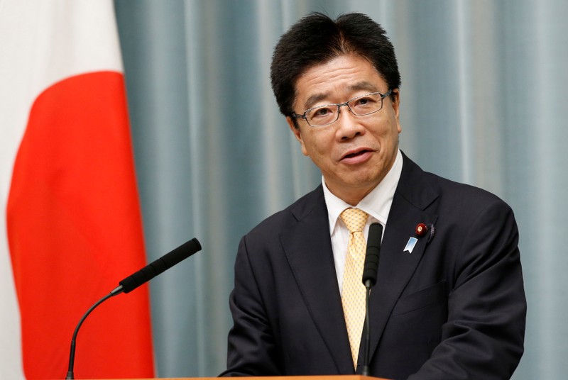 FILE PHOTO: Japan's Health, Labour and Welfare Minister Katsunobu Kato speaks at a news conference in Tokyo