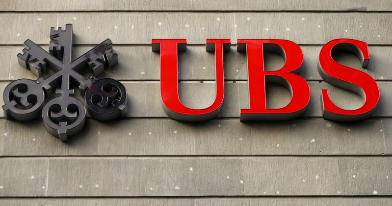 FILE PHOTO: The logo of Swiss bank UBS at an office building in Zurich