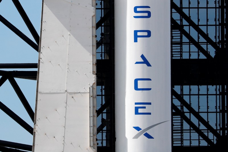 FILE PHOTO: A SpaceX Falcon 9 carrying the Crew Dragon spacecraft sits on launch pad 39A prior to the uncrewed test flight to the International Space Station from the Kennedy Space Center in Cape Canaveral