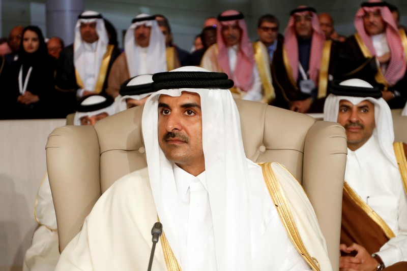 FILE PHOTO: Qatar's Emir Sheikh Tamim bin Hamad Al-Thani attends the 30th Arab Summit in Tunis