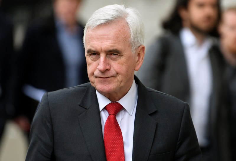 Britain's Shadow Chancellor of the Exchequer John McDonnell arrives at Cabinet Office in London