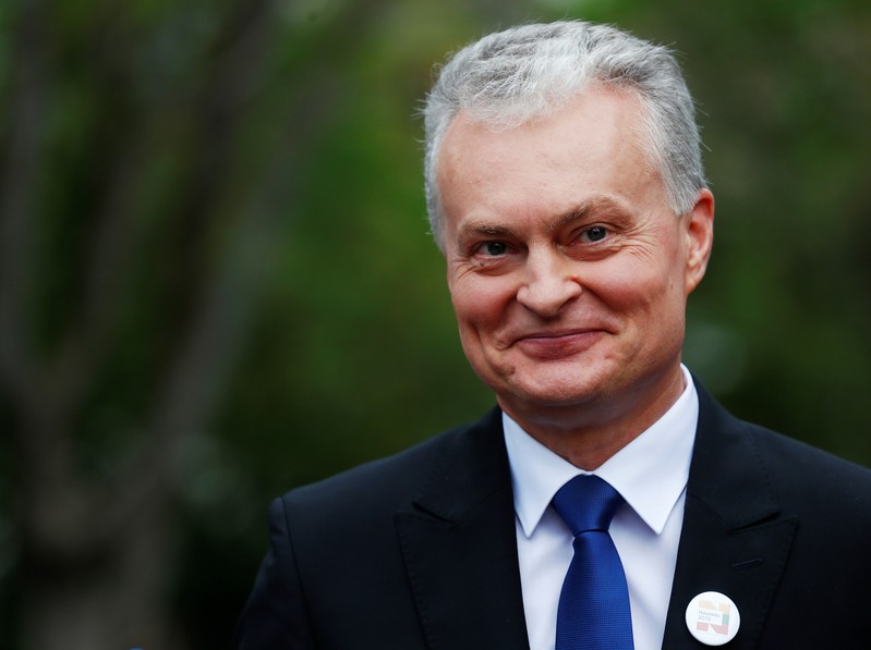 Presidential candidate Gitanas Nauseda smiles during the second round of Lithuanian presidential election in Vilnius