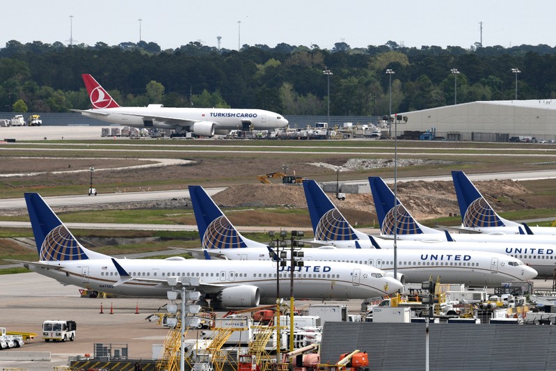 FILE PHOTO: United Airlines planes, including a Boeing 737 MAX 9 model, are pictured at George Bush Intercontinental Airport in Houston