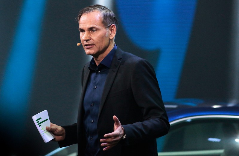 FILE PHOTO: Oliver Blume, CEO of Porsche AG, speaks during a Porsche press conference at the Los Angeles Auto Show in Los Angeles