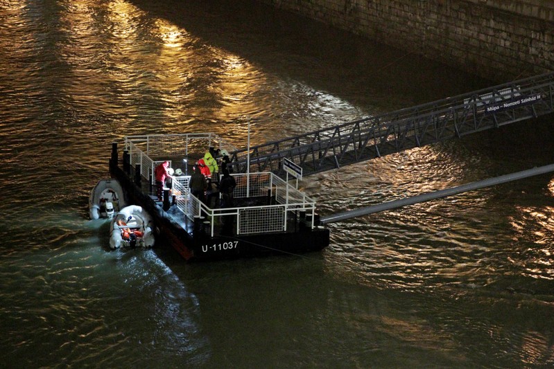 A rescue boat is seen on the Danube river after a tourist boat capsized in Budapest