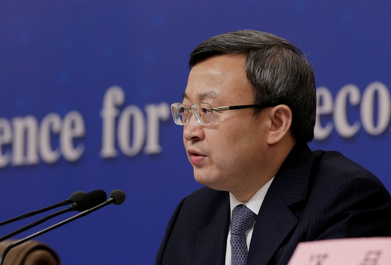 FILE PHOTO: Chinese Vice Commerce Minister and Deputy China International Trade Representative Wang Shouwen attends a news conference during ongoing session of the NPC in Beijing