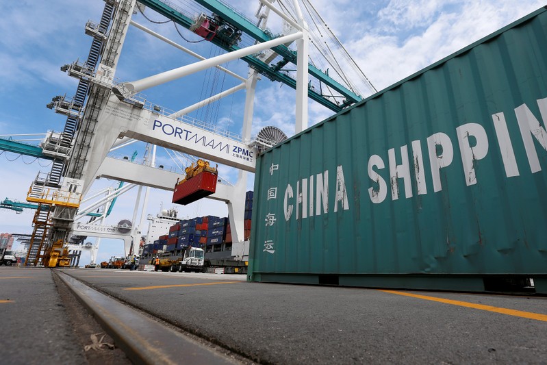A ship is unloaded using Super Post Panamax cranes in Miami