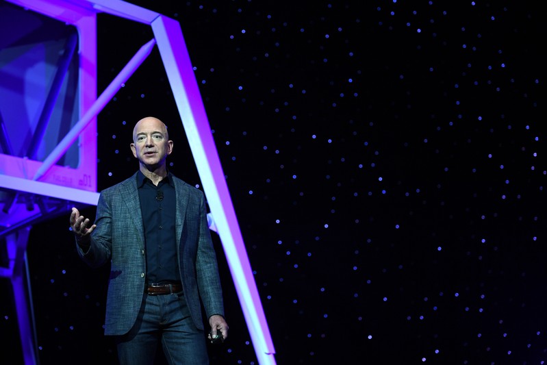 Founder, Chairman, CEO and President of Amazon Jeff Bezos unveils his space company Blue Origin's space exploration lunar lander rocket called Blue Moon during an unveiling event in Washington