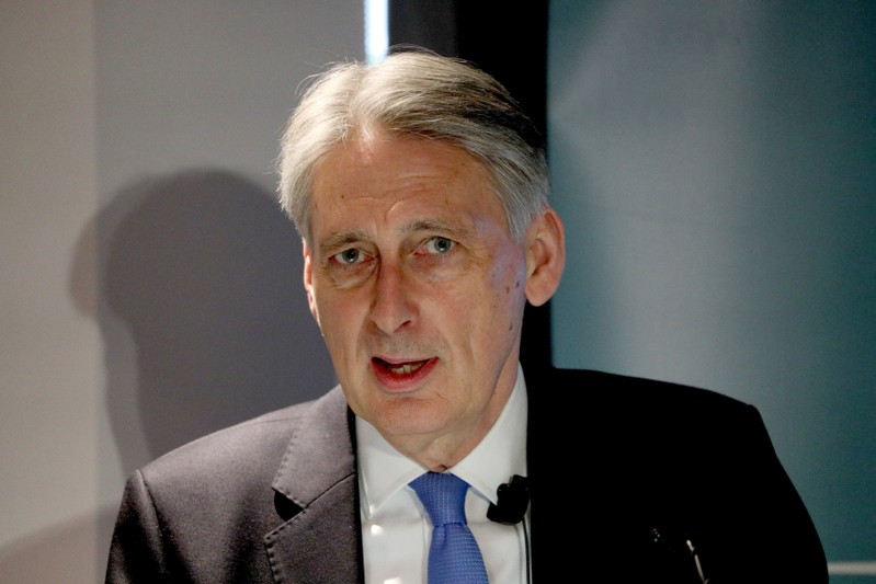 Chancellor of the Exchequer Philip Hammond speaks at the launch of a report, by living standards think tank the Resolution Foundation, on the impact of the higher minimum wage at the Resolution Foundation offices in London