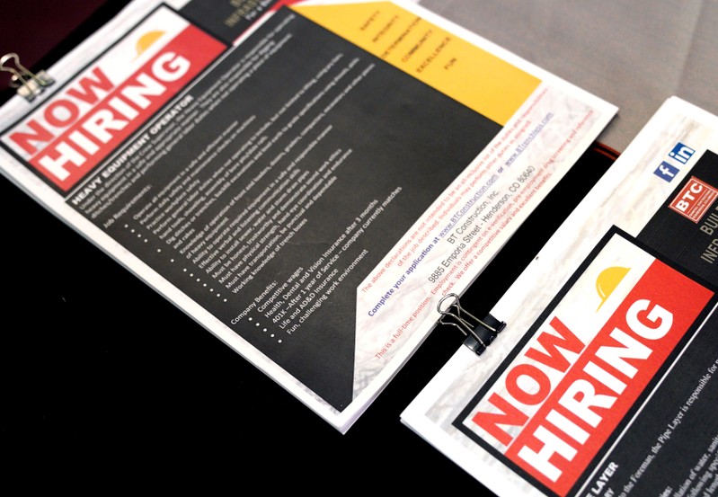 FILE PHOTO: Brochures are displayed for job seekers at the Construction Careers Now! hiring event in Denver