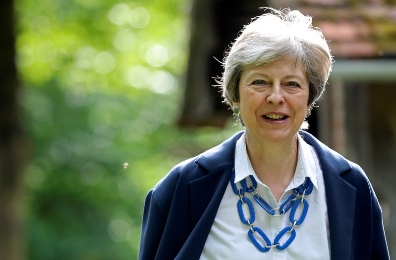 Britain's Prime Minister Theresa May leaves at church near High Wycombe