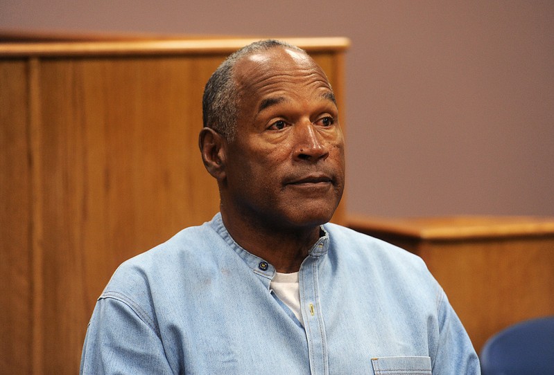 FILE PHOTO: O.J. Simpson reacts during his parole hearing at Lovelock Correctional Centre in Lovelock