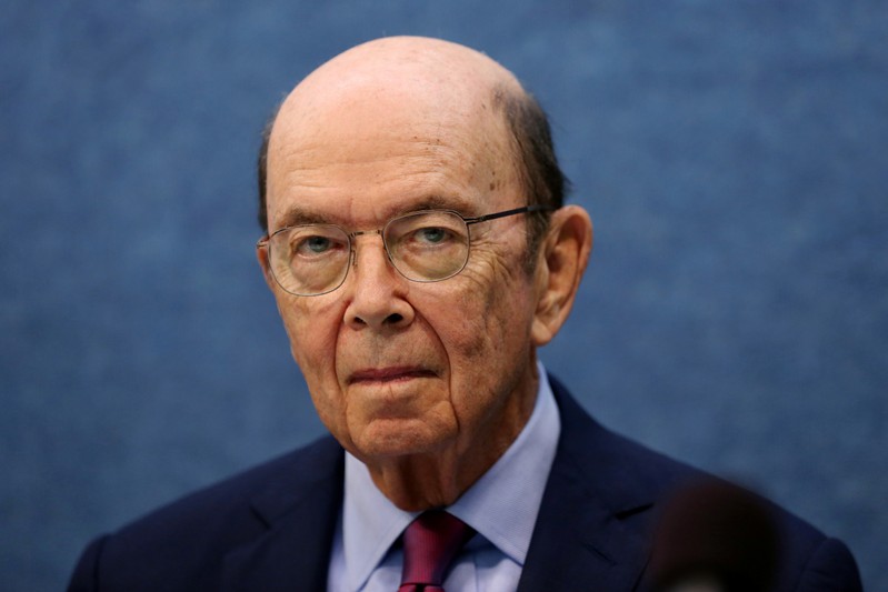 Participants including Commerce Secretary Wilbur Ross and NASA Administrator Jim Bridenstine at a press preview event in Washington