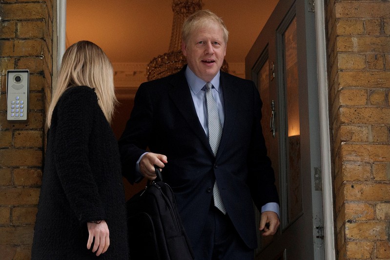 PM hopeful Boris Johnson leaves his home in London