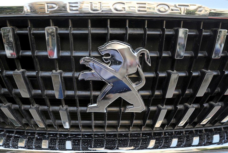 FILE PHOTO: The logo of Peugeot carmaker is seen on a vehicle in Cairo