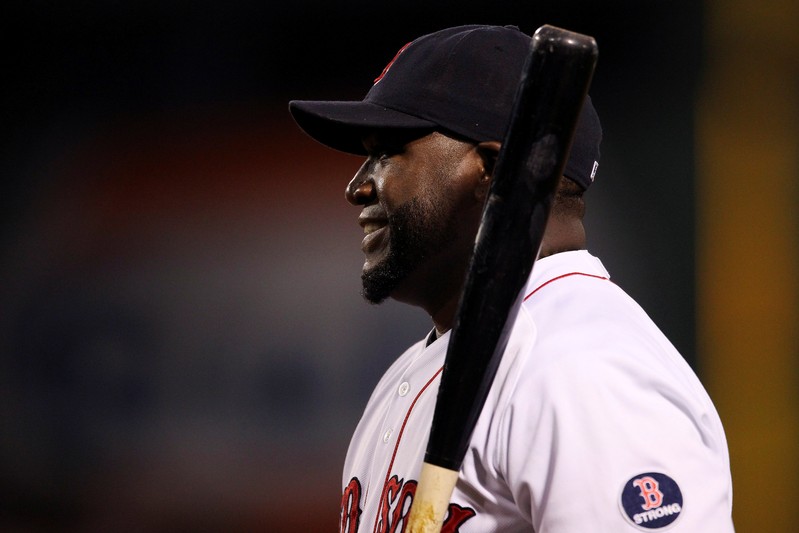 FILE PHOTO: Boston Red Sox's Ortiz smiles during warmups before facing the Toronto Blue Jays in their MLB American League East baseball game in Boston