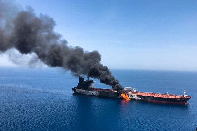 An oil tanker is seen after it was attacked at the Gulf of Oman