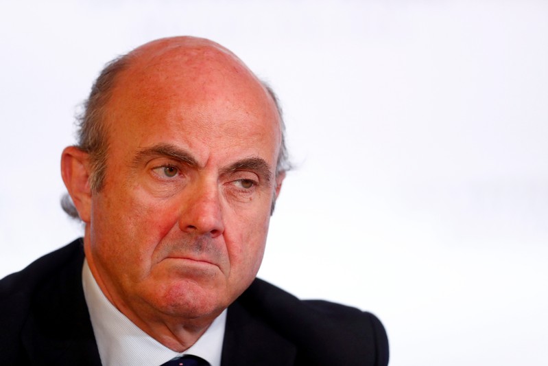 Vice-President of the European Central Bank Luis de Guindos listens during the news conference in Riga