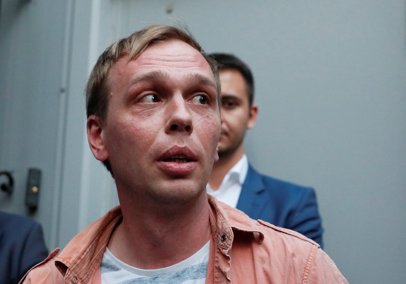 Russian journalist Golunov walks out of an office of criminal investigations in Moscow