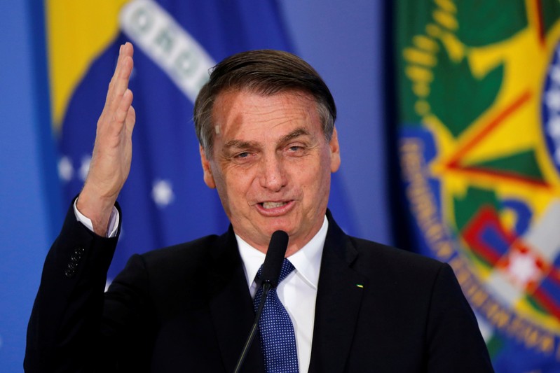 Brazil's President Jair Bolsonaro attends a ceremony of the Brazilian National Development Bank (BNDES) Line of Credit for Philanthropic Organizations at the Planalto Palace in Brasilia