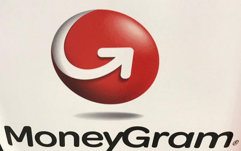 FILE PHOTO: The MoneyGram logo is seen on a kiosk in New York