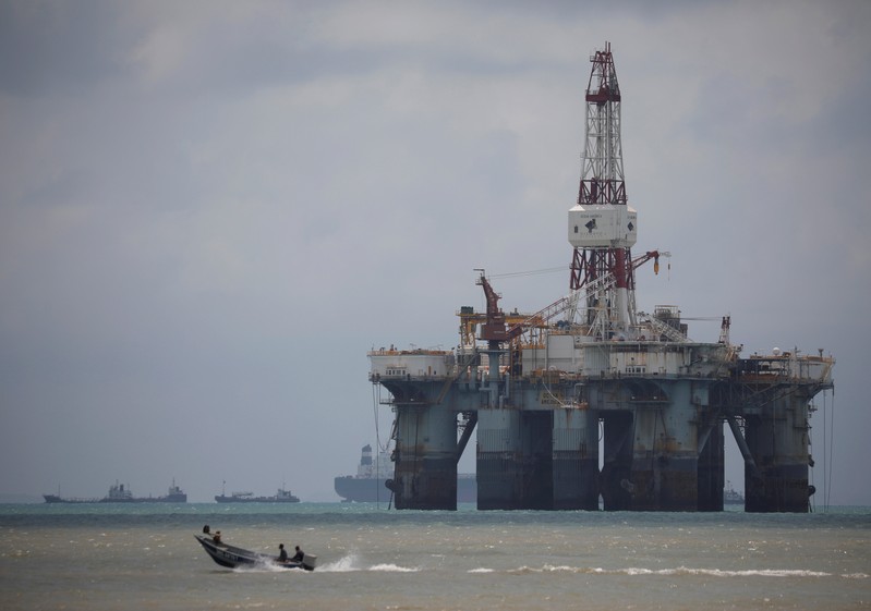 FILE PHOTO: An oil rig is seen in the waters on the southern coast of Pengerang