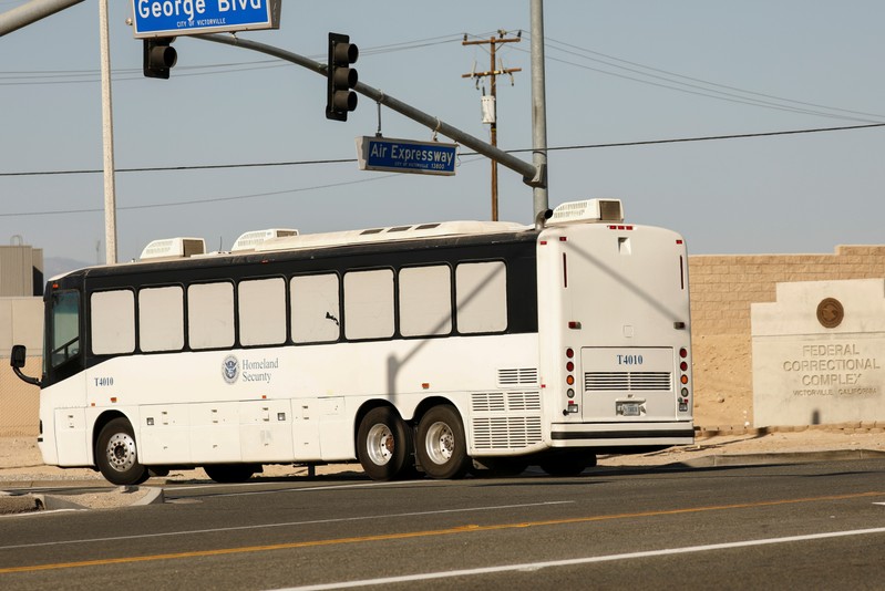 Immigration and Customs Enforcement (ICE) detainees arrive at FCI Victorville federal prison in Victorville