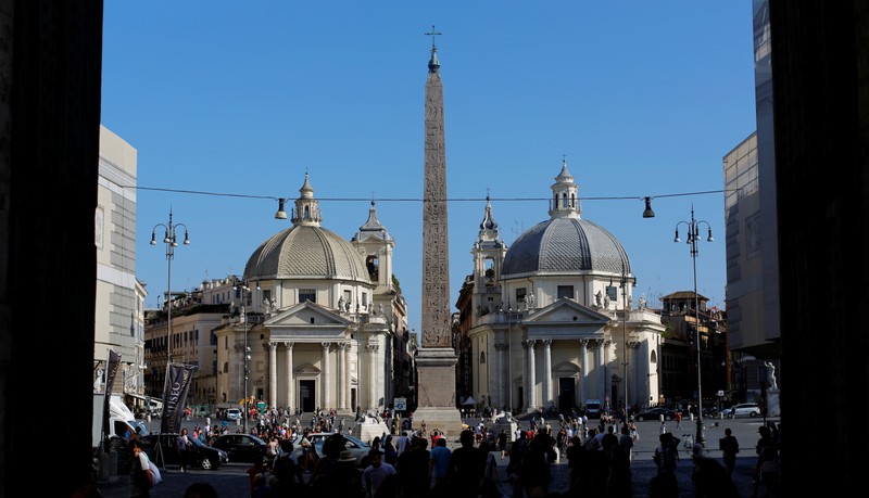 FILE PHOTO: People walk in the Popolo's Square in Rome