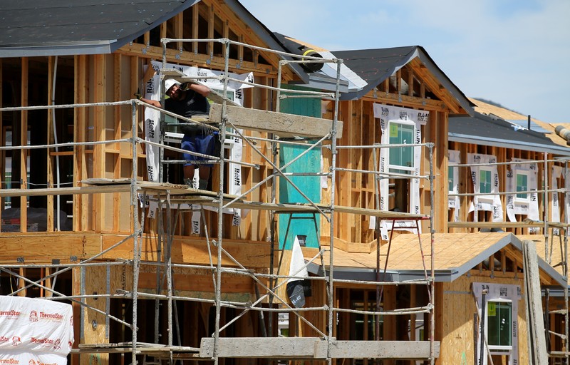 FILE PHOTO: Single family homes being built by KB Homes are shown under construction in San Diego