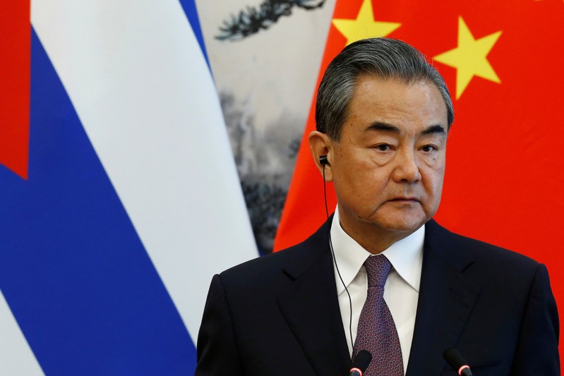 FILE PHOTO: Chinese Foreign Minister Wang Yi attends a news conference at Diaoyutai state guesthouse in Beijing